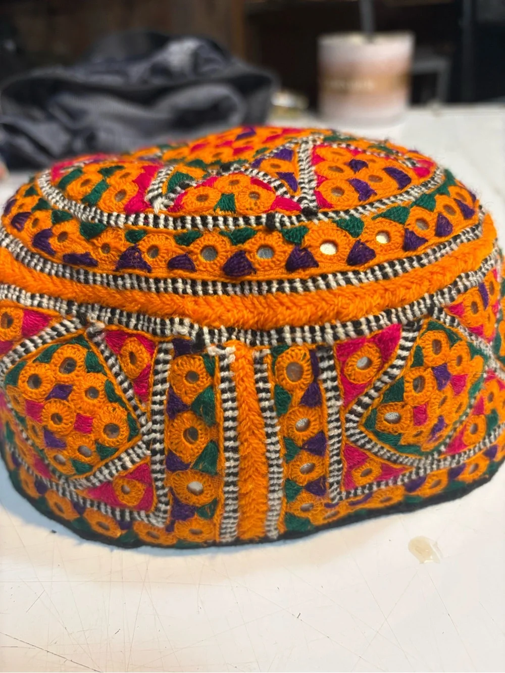 traditional handmade Balochi or Bugti cap featuring vibrant yellow embroidery
